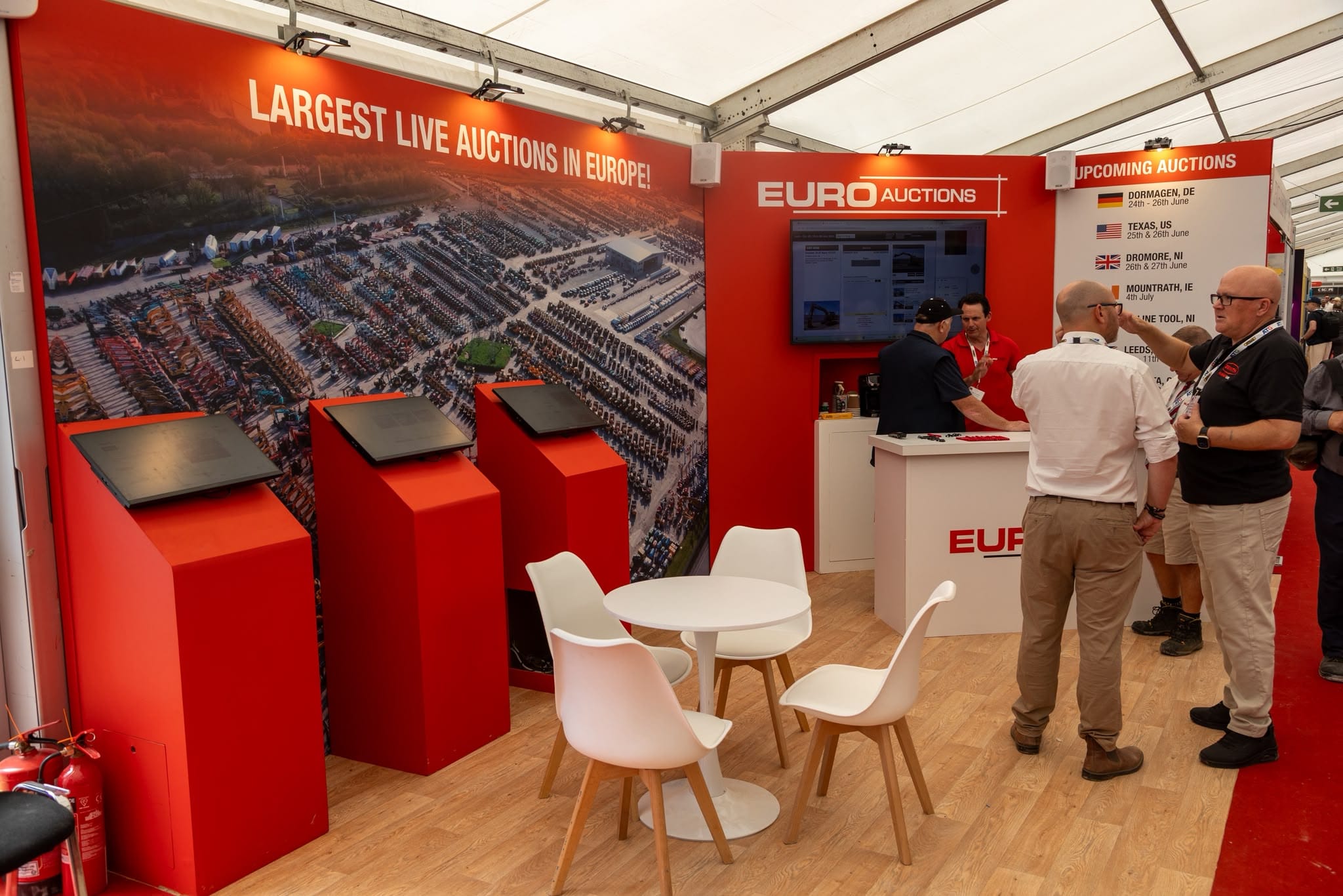 Euro Auctions stand with aerial auction yard graphic and kiosk podiums at Hillhead