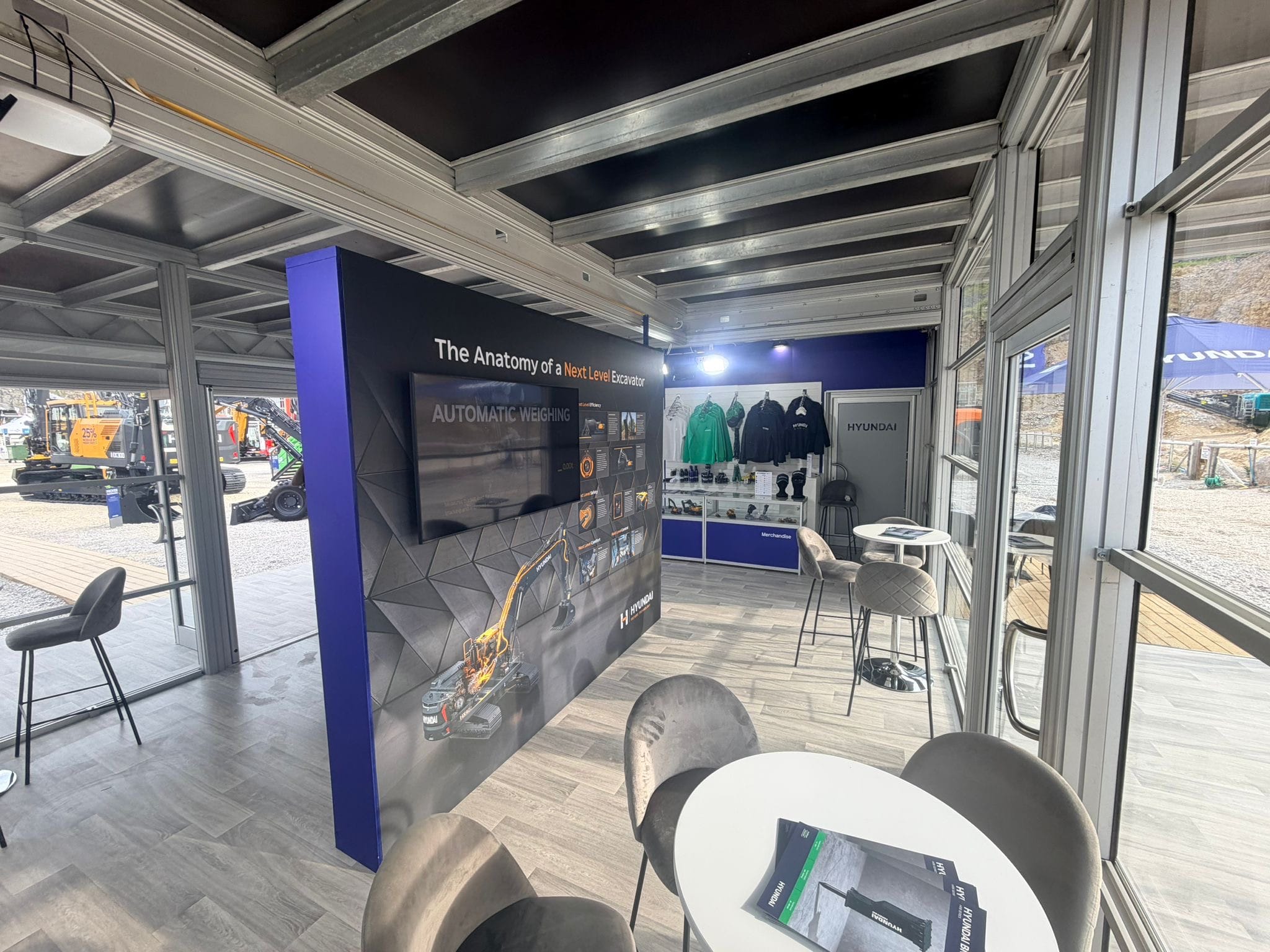 Interior graphics and seating area inside the Hyundai structure at Hillhead