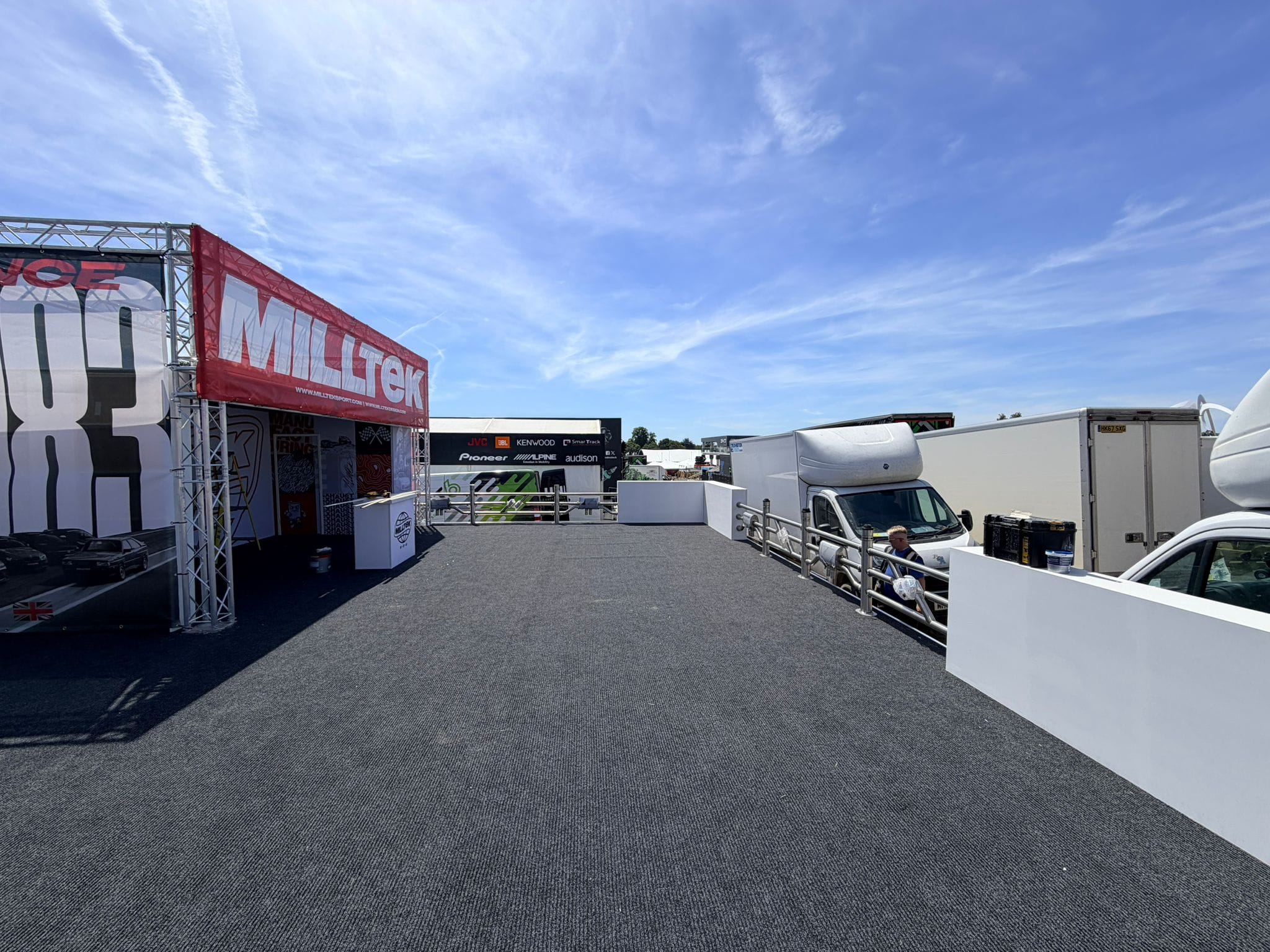 Approach to the Milltek stand showing carpet matting over the levelled subfloor