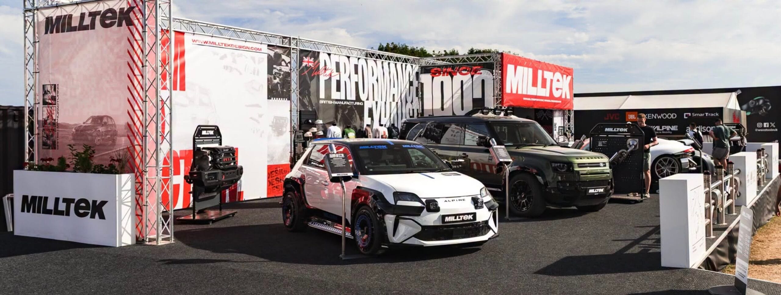 Milltek stand at Goodwood Festival of Speed with client cars on display